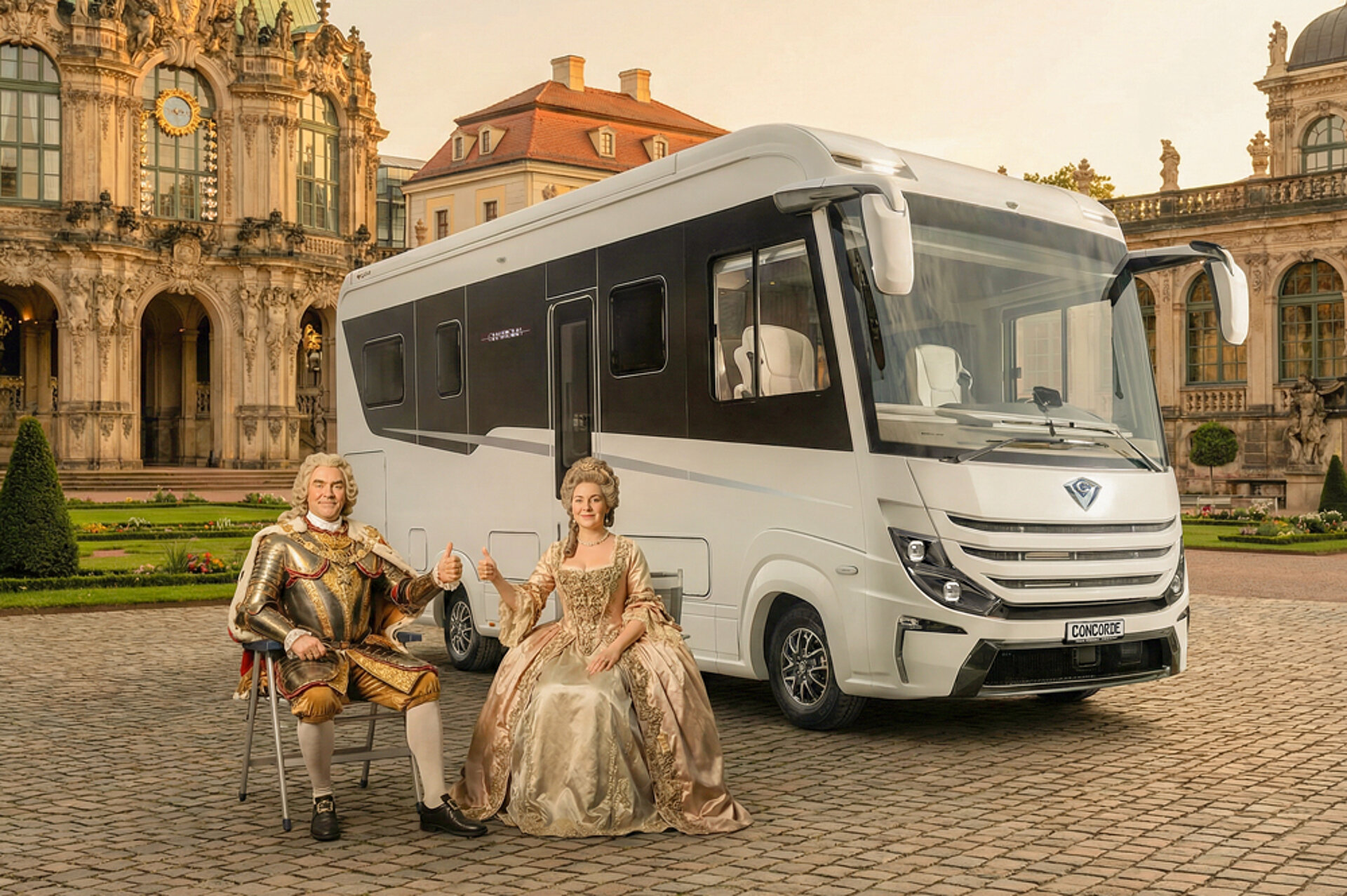 Ein Luxuswohnmobil steht vor einem futuristischen Hintergrund.