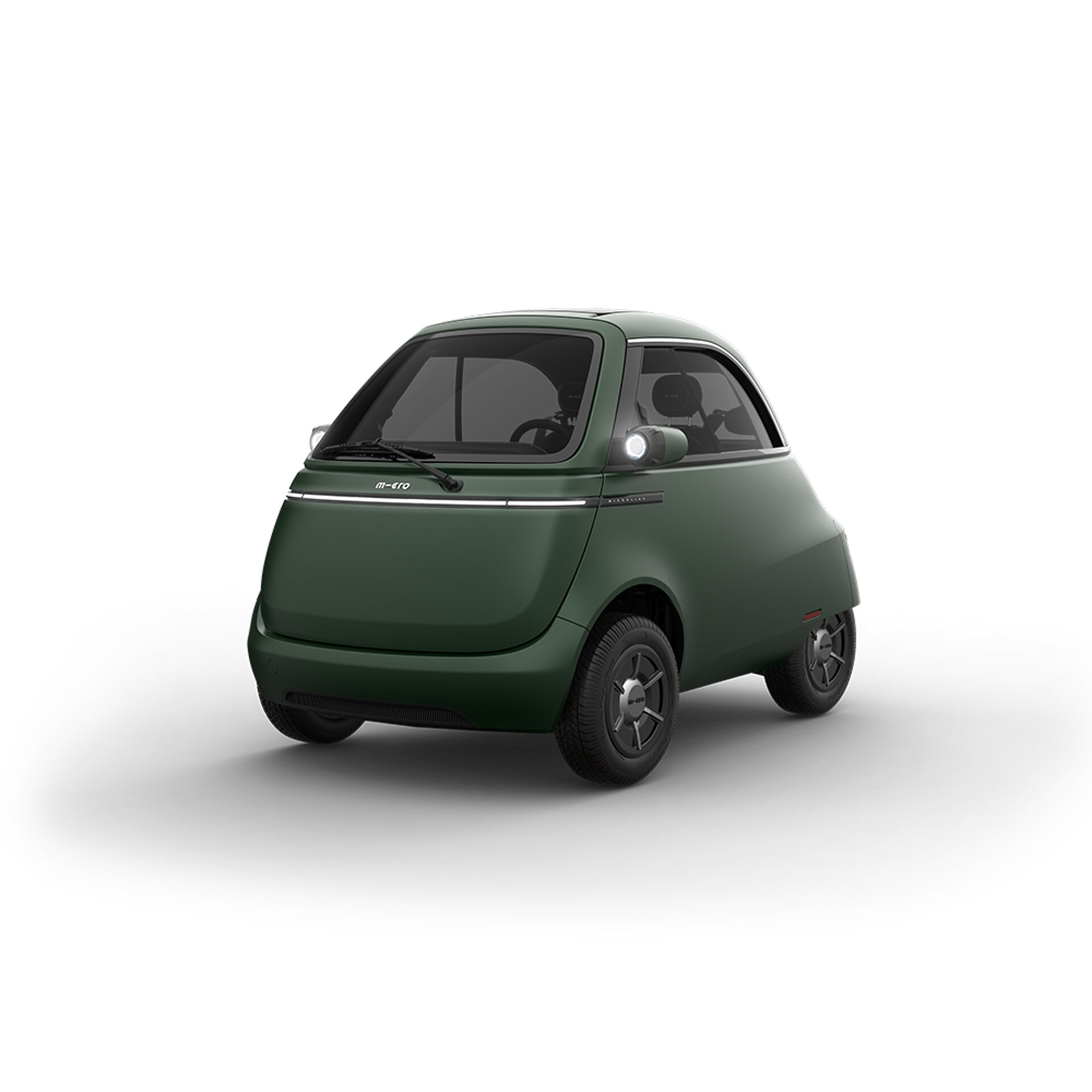 Kompaktes Microlino Micro Car in dunkelgrün von schräg vorne.